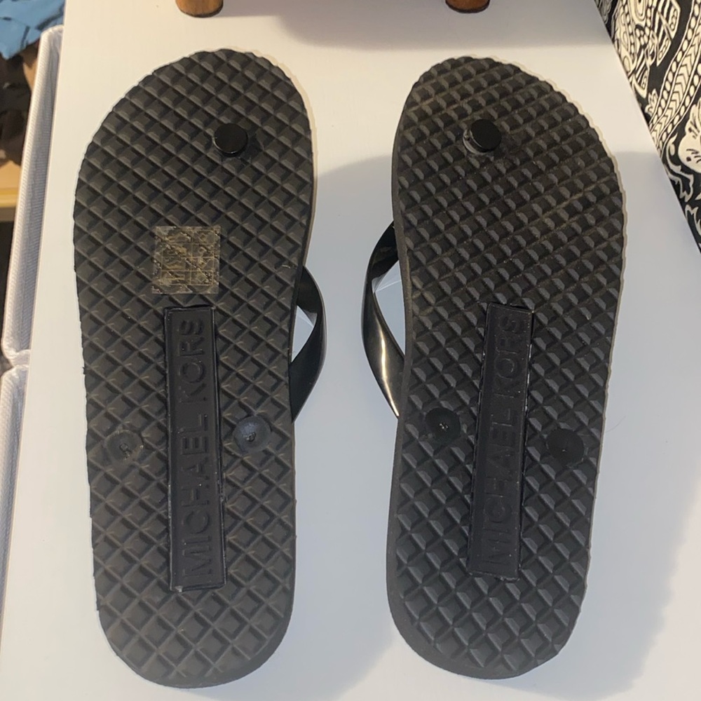 Michael Kors flip flops